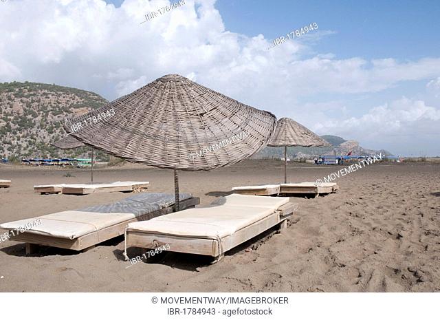 Sunbeds and sunshades on Iztuzu beach, Dalyan, Lycia, Turkey, Asia