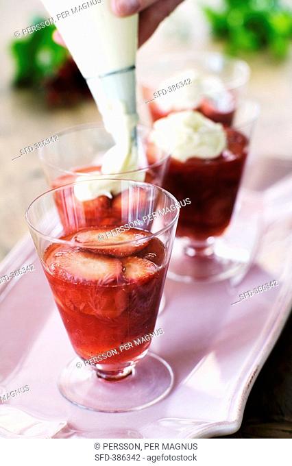 Strawberry and rhubarb dessert with cream