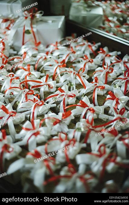 Favors with white and red ribbons