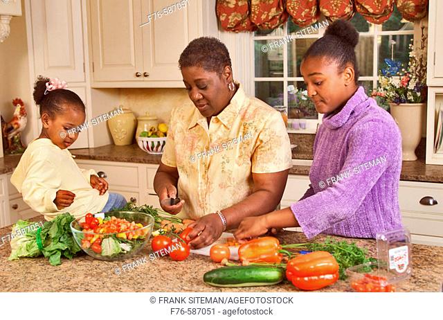 Free Photo  African american mother and son cooking together in the kitchen