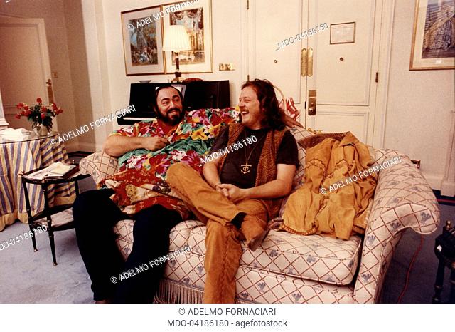 The Italian tenor Luciano Pavarotti posing with the Italian singer Zucchero Fornaciari at Hyde Park Hotel during their artistic collaboration for ""Miserere""...