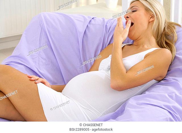 PREGNANT WOMAN RESTING<BR>Model. Woman 5 months pregnant