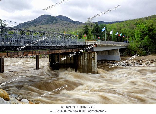 East Branch of the Pemigewasset River in Lincoln, New Hampshire USA near the entrance to Loon Mountain during the spring months after heavy rains