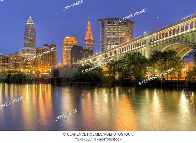 The skyline of Cleveland, Ohio, USA at twilight as viewed over the Cuyahoga River from the Flats