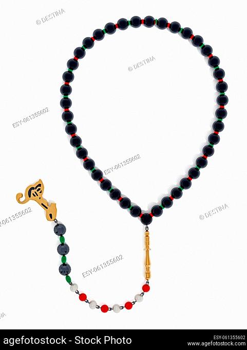 Praying beads with black, red and green gems. 3D illustration