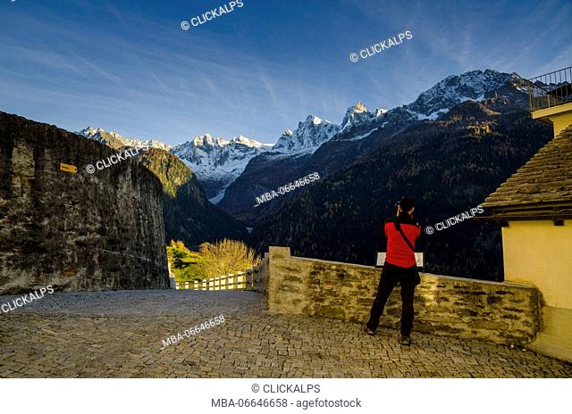 Photographer in Soglio (Bregaglia valley, Grisons, Swiss alps)