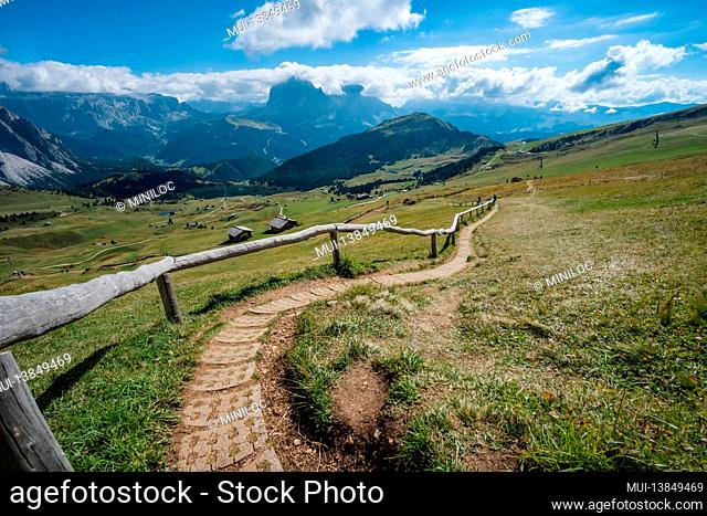 Hiking path and epic landscape of Seceda peak in Dolomites Alps, Odle mountain range, South Tyrol, Italy, Europe