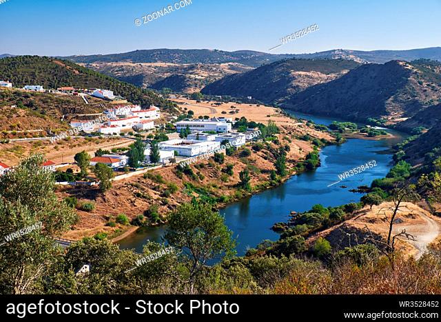 View of the river Guadiana flowing through the valley near Mertola. Portugal