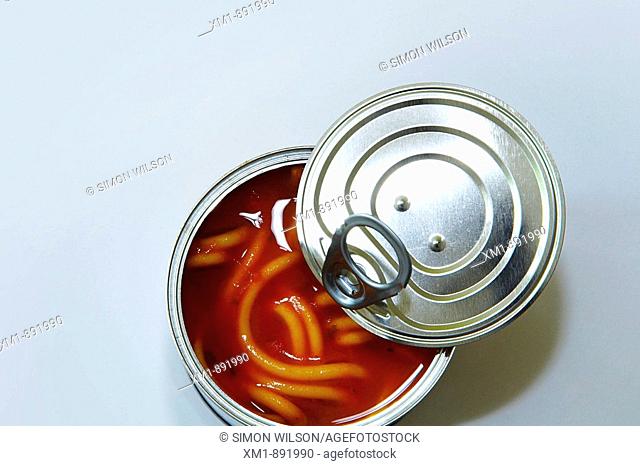 Opened can of spaghetti in tomato sauce