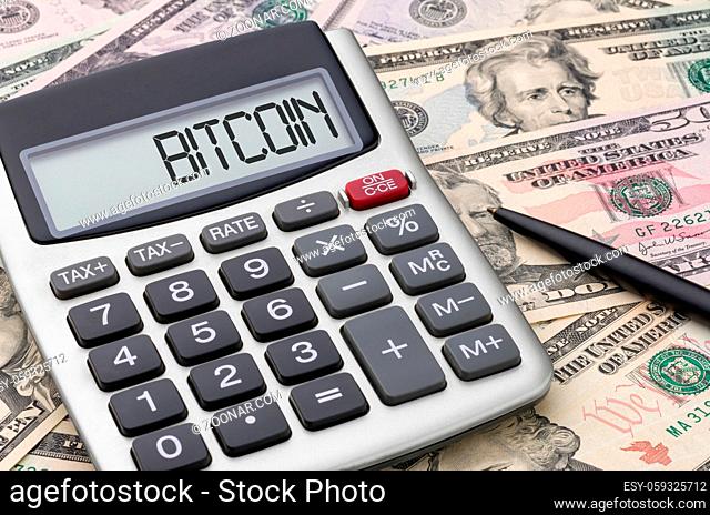 Calculator with dollar bills - Bitcoin