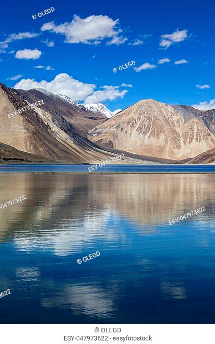 Sunny day at Pangong Lake water and Himalayan mountain in India. Pangong Lake, is an endorheic lake in the Himalayas situated at a height of about 4