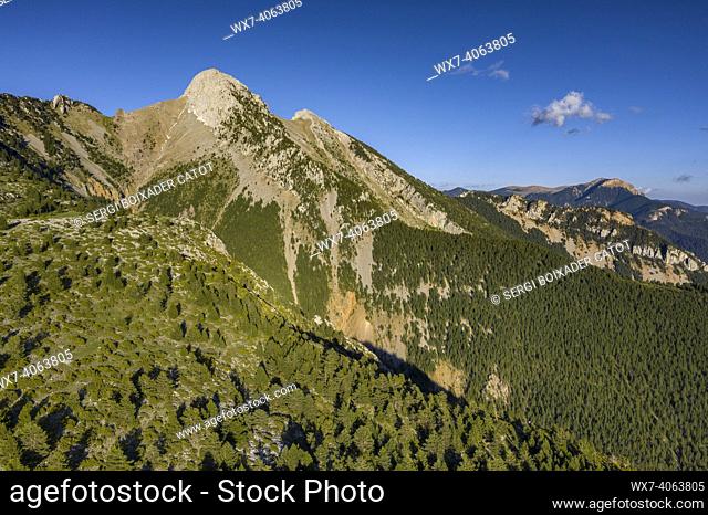 Pedraforca west face aerial view in a spring afternoon over Gósol Valley (Barcelona province, Catalonia, Spain, Pyrenees)