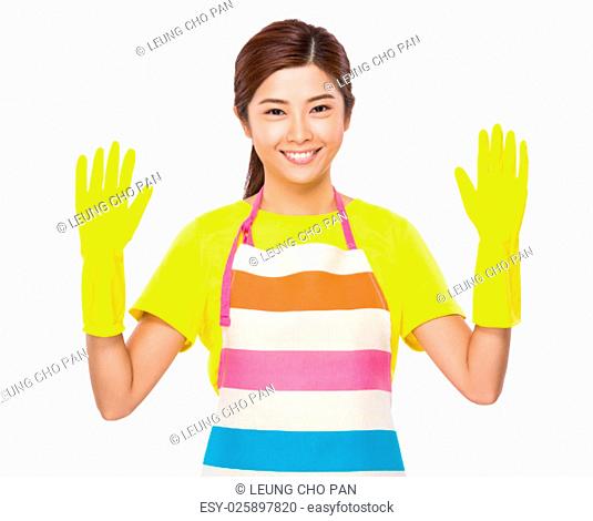 Young Housewife wear with plastic gloves