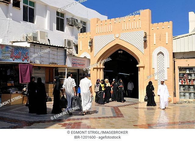 People in front of the entrance to Mutrah Souk, Muscat, Sultanate of Oman, Arabia, Middle East
