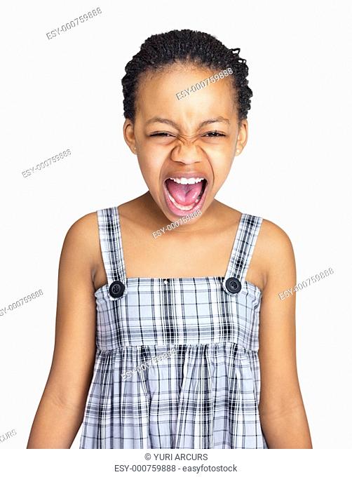 Angry little African American girl shouting isolated on white background