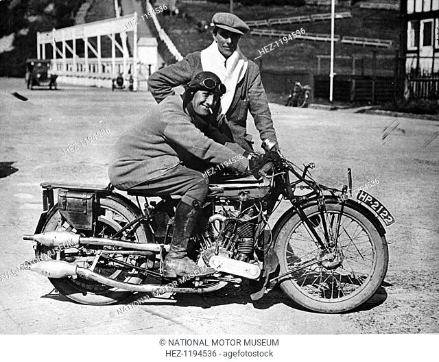 Mk1 Brough Superior 1000cc motorbike, (early 1920s?). JA Watson-Bourne, a motorcycle racer of the early 1920s is on the machine