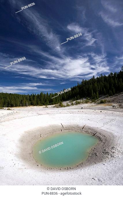 The deep turquois colour of Norris Basin's Porcelain Pool in Yellowstone National Park