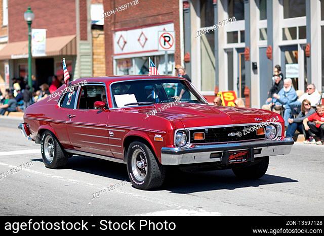 Orleans, Indiana, USA - April 28, 2018: The Orleans DogWood Festival and Parade, A classic car going down the street during the parade a Chevrolet Nova 350...