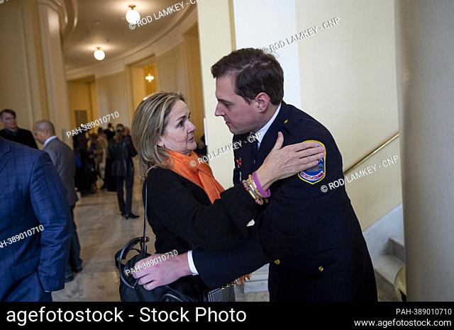 Metropolitan Police Officer Daniel Hodges, right, embraced by United States Representative Madeleine Dean (Democrat of Pennsylvania) as he waits to depart...