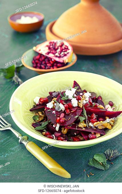 Beetroot salad with feta cheese and pomegranate seeds (vegetarian)