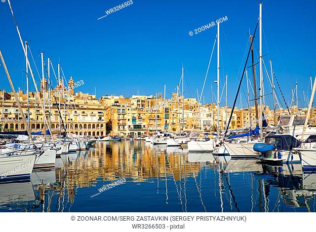 View on yachts moored in Dahla tad-Dockyard bay between Senglea and Birgu, Malta