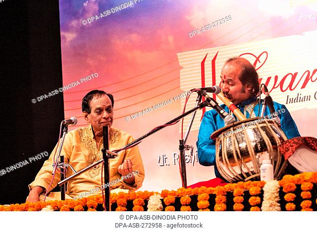 Indian Carnatic vocalist M Balamuralikrishna and flautist Ronu Majumdar performing, Mumbai, Maharashtra, India