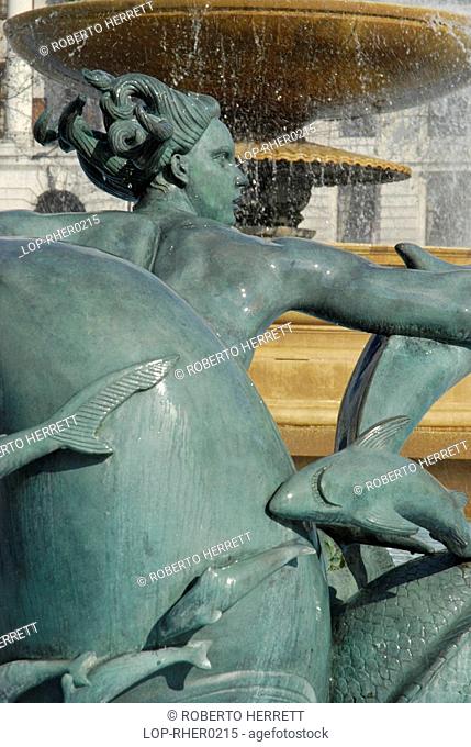 England, London, Trafalgar Square, Close up of mermaid and fish statue in Trafalgar Square fountain