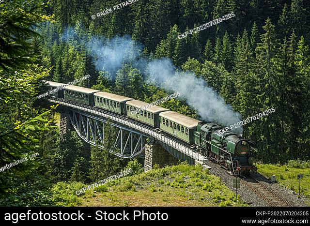 A steam train crosses a bridge on the line between Korenov and Sklarska Poruba, Poland, as part of the celebration of 120 years of the Tanvald - Korenov cog...