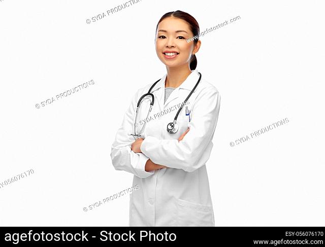 happy smiling asian female doctor in white coat