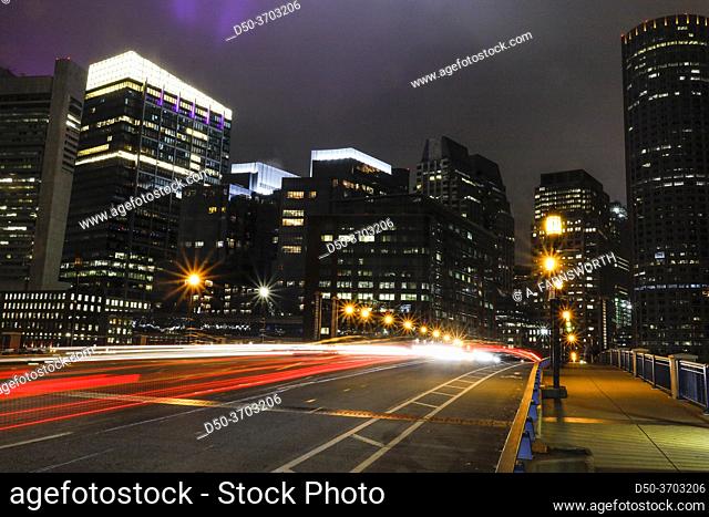Boston, Massachusetts, USA Traffic and light trails on The Seaport Boulevard bridge