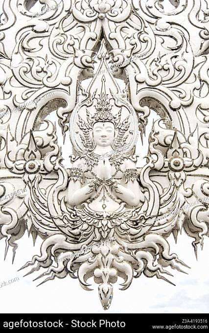 Closeup of the White Temple (Wat Rong Khun); a Buddhist temple designed and constructed by national artist Chalermchai Kositpipat and one of the most...