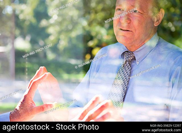 Man looking at his reflection