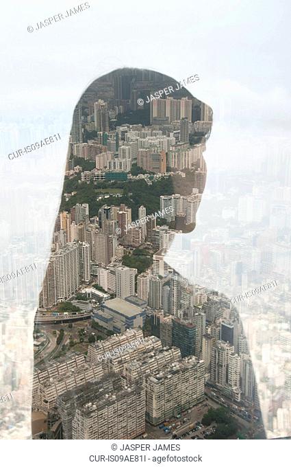 Businesswoman and Hong Kong cityscape, composite image