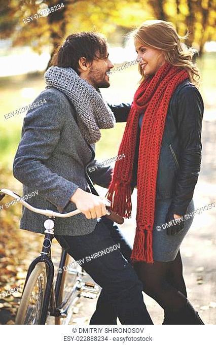 Man on bike and his girlfriend
