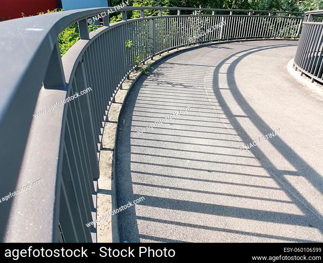Pedestrian bridge with nice curve and nice railing shade