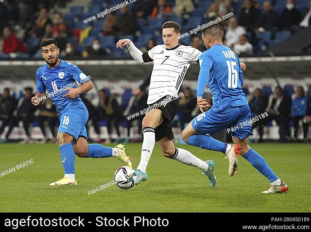 March 26, 2022, PreZero Arena, Sinsheim, friendly match Germany vs. Israel, in the picture Mohammed Abu Fani (Israel), Julian Draxler (Germany)