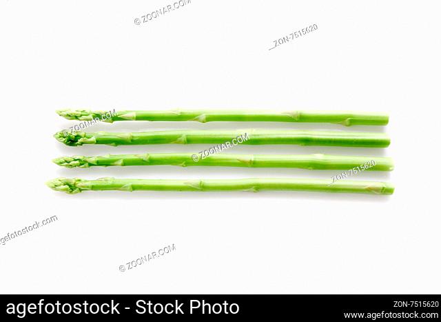 fresh asparagus isolated on white background