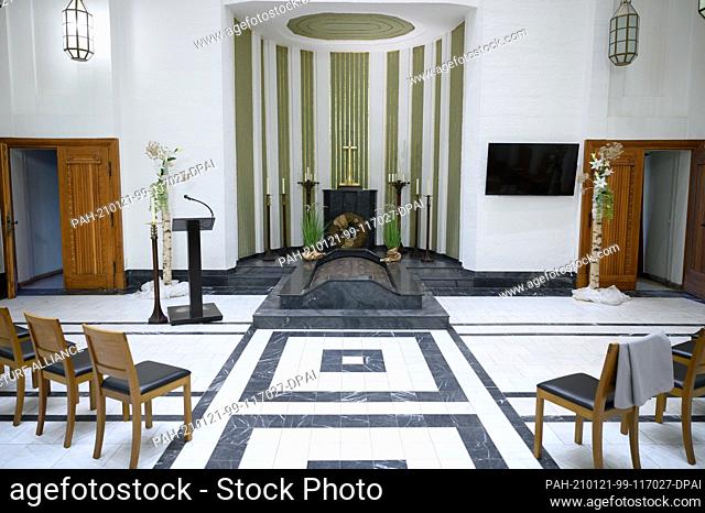 21 January 2021, Saxony, Görlitz: Chairs stand next to each other in the empty ceremony hall in the crematorium Görlitz. Photo: Sebastian...