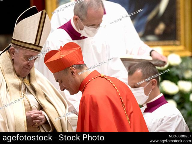 Pope Francis presides over the public consistory for the creation of thirteen new cardinals in the Vatican Basilica, maintaining severe anti-Covid-19 measures