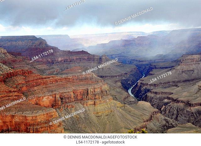Colorado River and Grand Canyon with rain clouds National Park Arizona