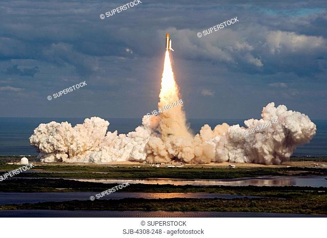 CAPE CANAVERAL, Fla. - Space shuttle Atlantis races to orbit from Launch Pad 39A on a perfect Florida afternoon at NASA's Kennedy Space Center