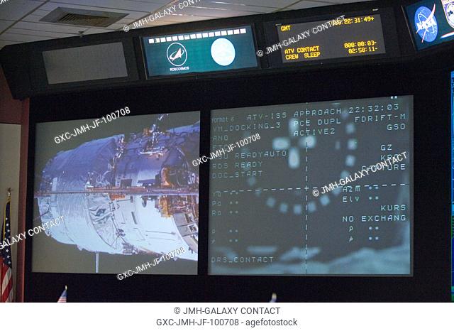 The big screens in the space station flight control room in the Mission Control Center at NASA's Johnson Space Center are pictured during rendezvous and docking...