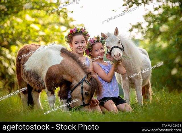girls and Mini Shetland Ponies