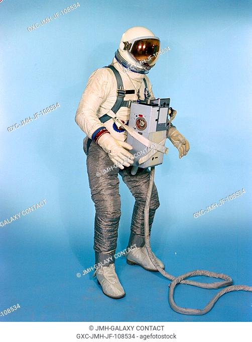 Test subject Fred Spross, Crew Systems Division, wears configured extravehicular spacesuit assembly and Extravehicular Life Support System chest pack