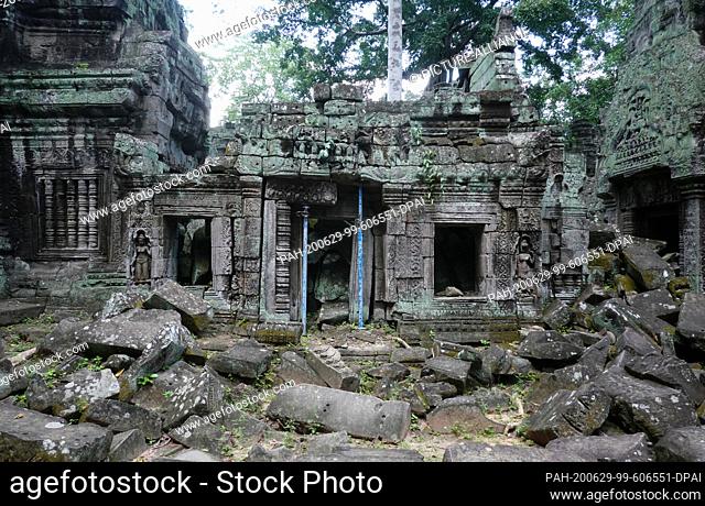 23 October 2019, Cambodia, Siem Reab: Decayed building of the temple Ta Prohm. The temple monastery was the scenery of the movie ""Tomb Raider"" and is...