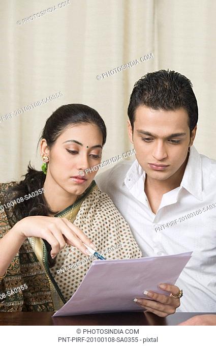 Couple preparing home budget