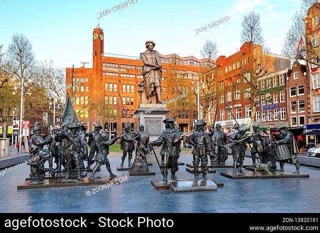 Rembrandtplein, Amsterdam, Netherlands - April 18, 2019: Monument to famous painter Rembrandt and sculptures based on his painting