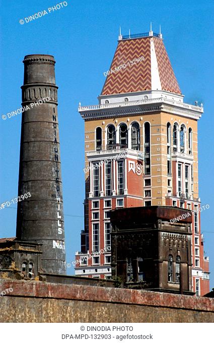 A dilapidated India United mills near the newly constructed five star hotel ITC Grand Sheraton at Parel in central Bombay now Mumbai ; Maharashtra ; India