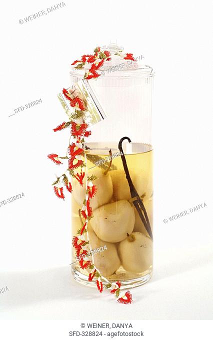 Pears preserved in vodka with vanilla pod for Christmas