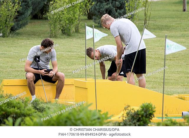 The players Joshua Kimmich (left to right), Julian Brandt and Leon Goretzka play minigolf in front of the ""Radisson Blue"" hotel's facilities at the Black Sea...